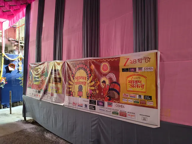 The Zee 24 Ghanta Sharad Ananya banner at the pandal