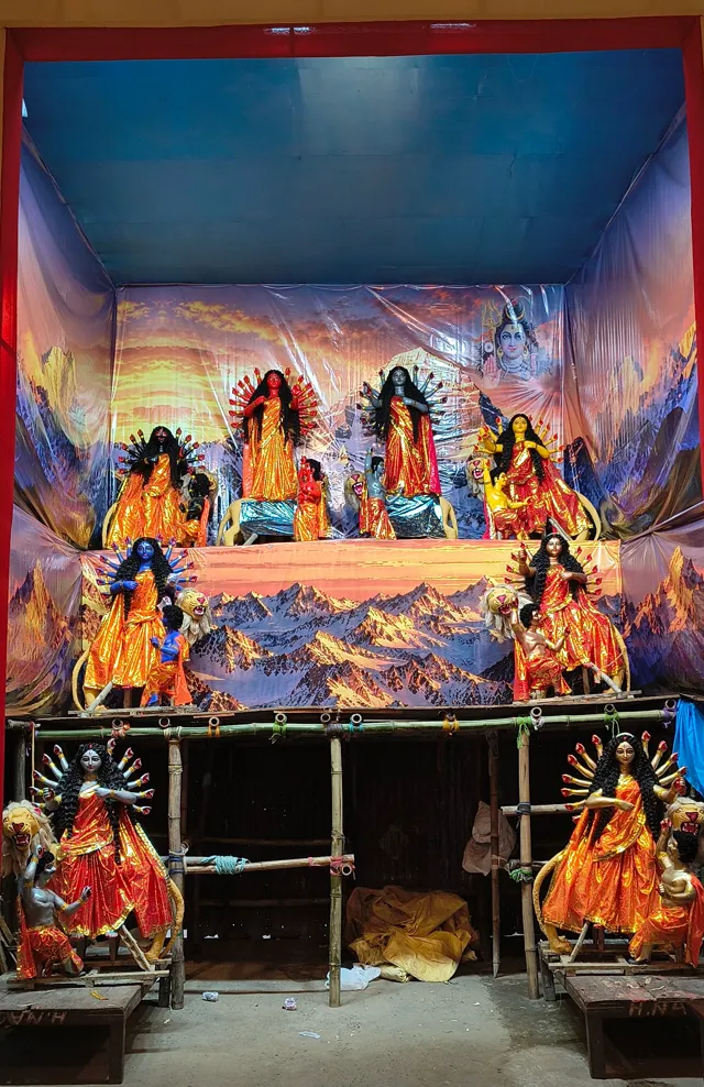 The nine goddesses take their places in the pandal
