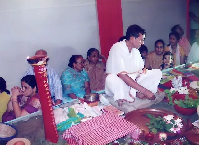 The priest at worship